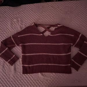 Two inch slots on the sides, slightly opened back, slightly cropped